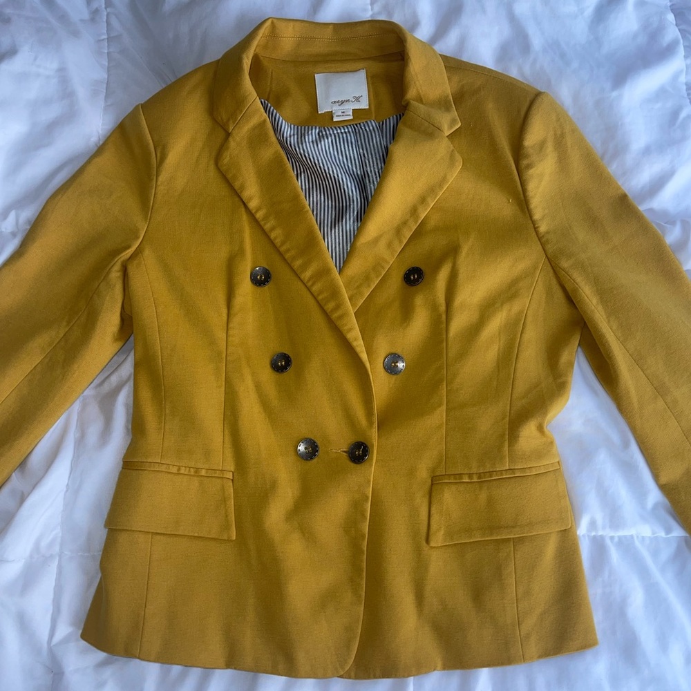 aryn K. yellow blazer
